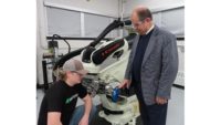 Professor  Tanbour works with Werth, a mechanical engineering student, in the Coherix 3D computer-vision and virtual-reality lab