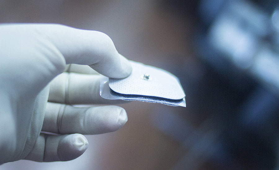 close up of adhesive applied to computer processor chip