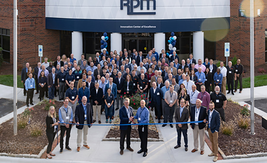 RPM employees gathered in front of RPM Center of Excellence