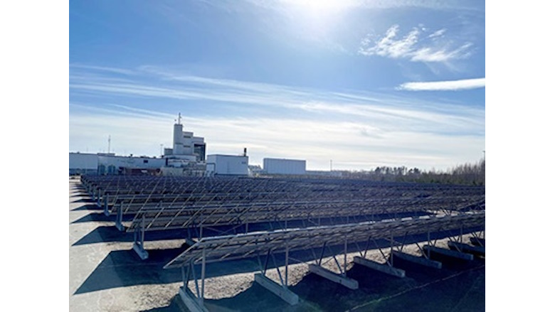 Trinseo facility with solar panels in foreground 