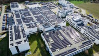 Aerial photo of DELO's photovoltaic system at its site in Windach, Germany