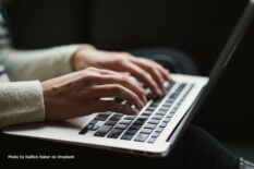 Photo of hands on a laptop